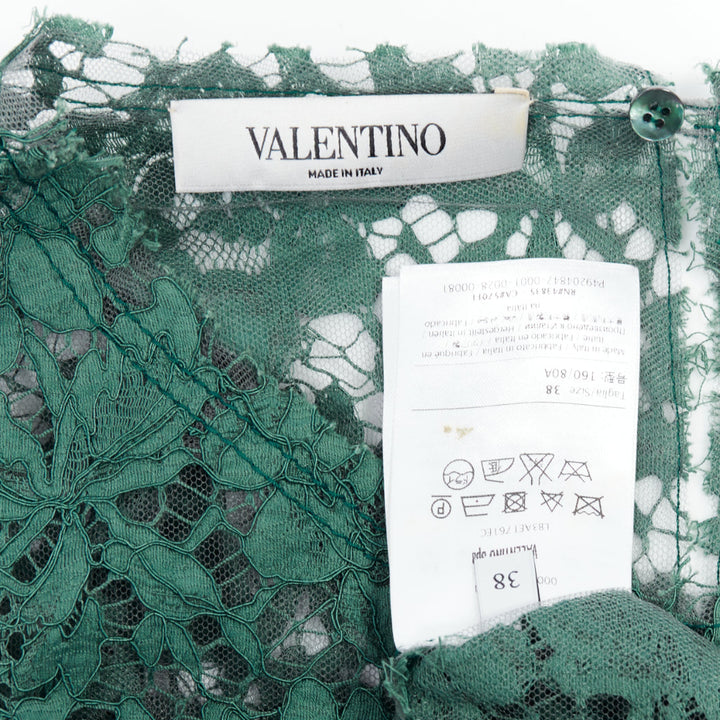 Female mannequin wearing Valentino by Pier Paolo Piccioli Green Cotton Women Top in Size IT38 | Available at JHROP