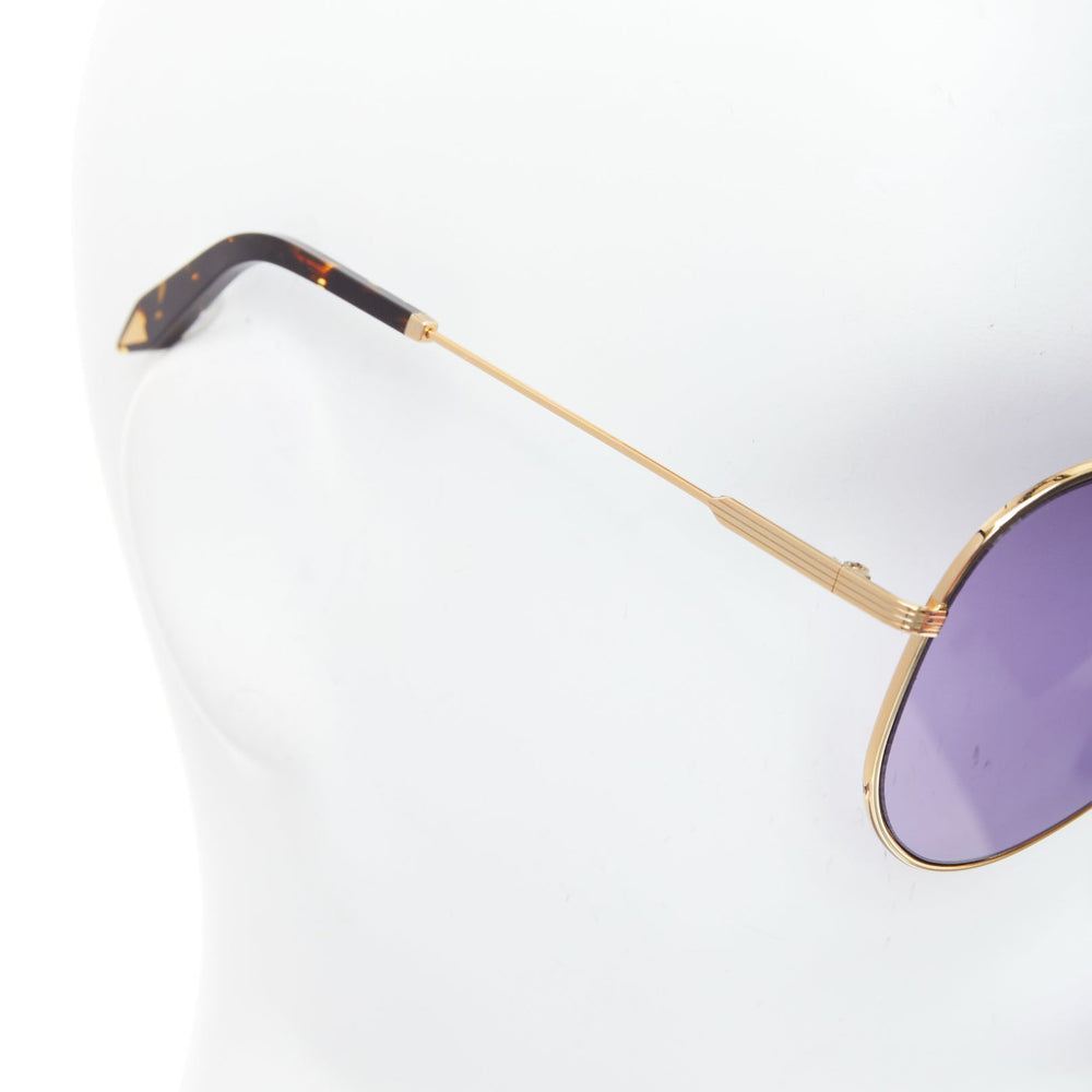 Female mannequin wearing Victoria Beckham VBS133 C04 Purple Metal Women Sunglasses in Size  | Available at JHROP