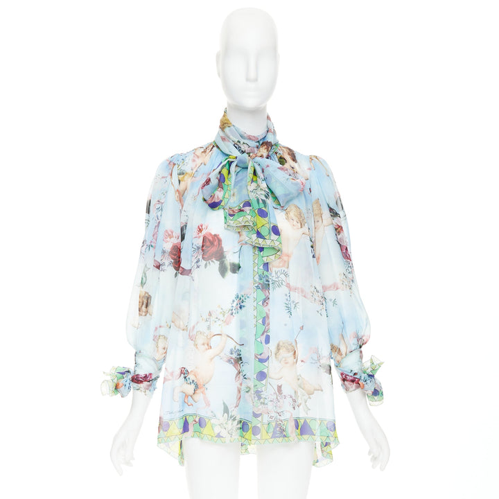 DOLCE GABBANA  100% silk blue Cherub Cupids print pussybow sheer blouse IT40 S