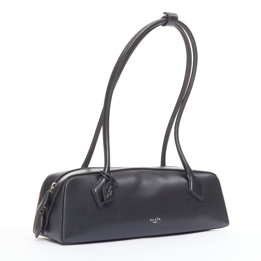 ALAIA Le Teckel black leather elongated long handle double zip bag
