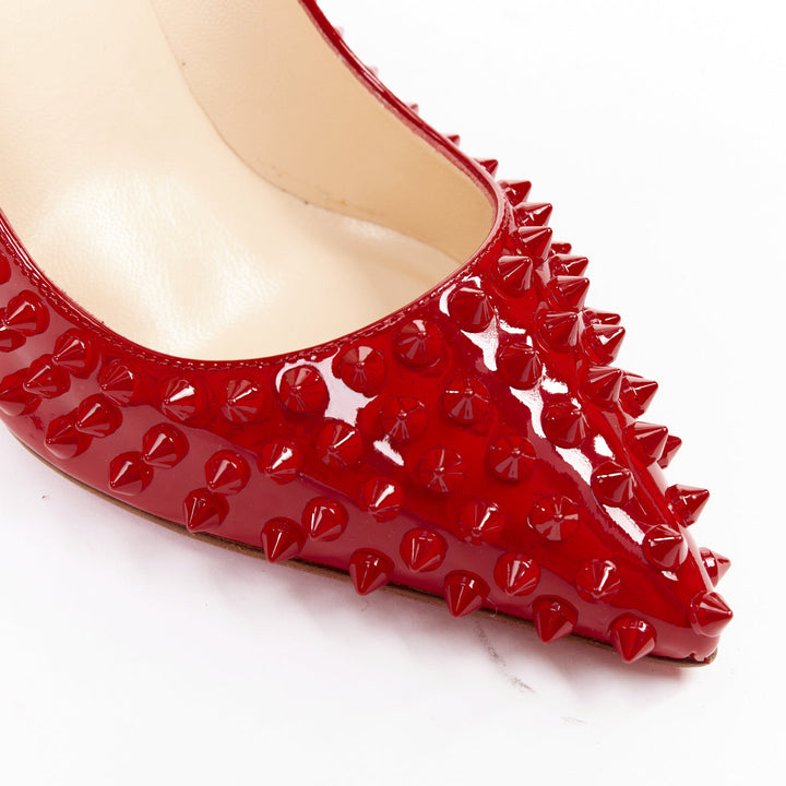 CHRISTIAN LOUBOUTIN Pigalle Spikes 100 red patent leather studded pumps EU38