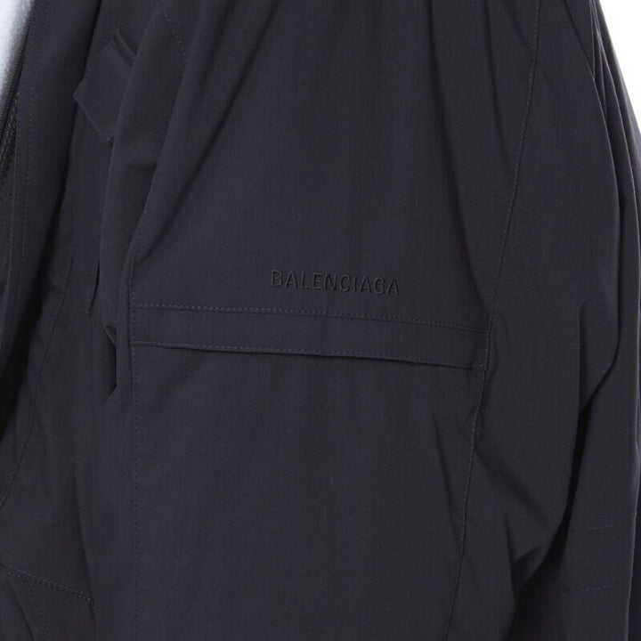 Male mannequin wearing Balenciaga by Demna Fall Winter 2018 Runway Black Nylon Men Coat in Size  L | Available at JHROP