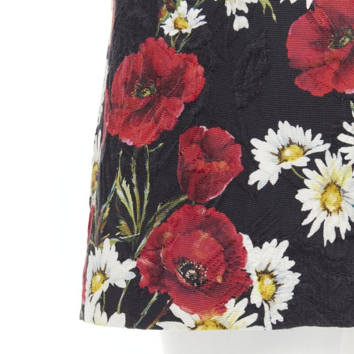 Female mannequin wearing Dolce Gabbana Poppy daisy jacquard dress Black Cotton Women Cocktail Dresses in Size IT36 | Available at JHROP