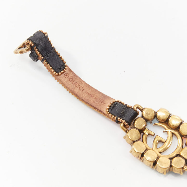GUCCI gold GG log rainbow crystal embellished black leather bracelet