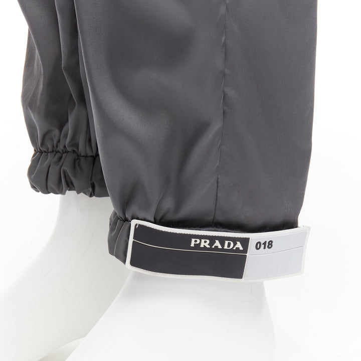 PRADA 2018 logo rubber tab grey gabardine nylon technical jogger pants IT46 S