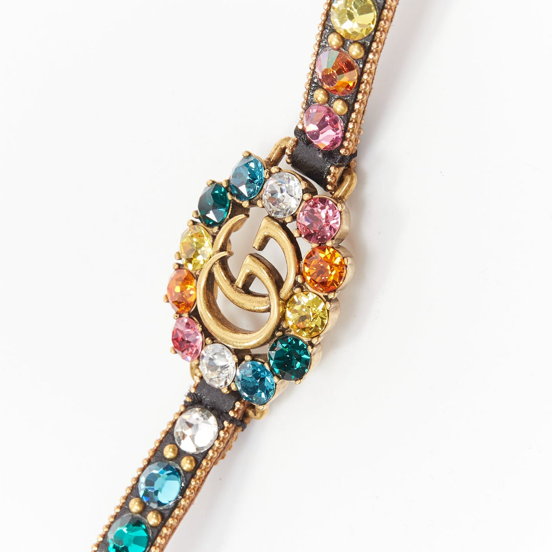 GUCCI gold GG log rainbow crystal embellished black leather bracelet