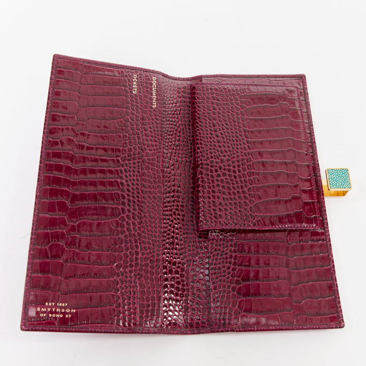 SMYTHSON Mara burgundy croc embossed high gloss teal clasp passport cover