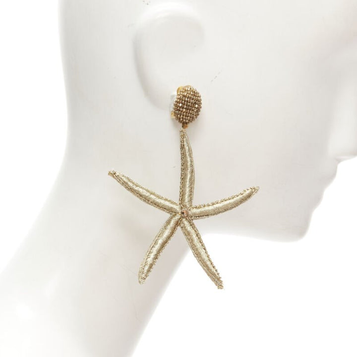 OSCAR DE LA RENTA gold Large Starfish bead embellished clip on earrings