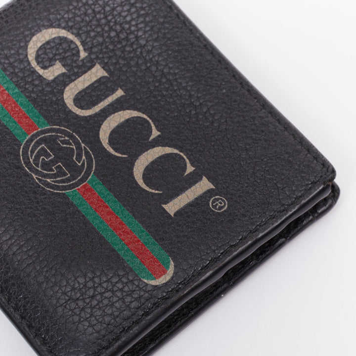 GUCCI black grained leather vintage logo bifold wallet