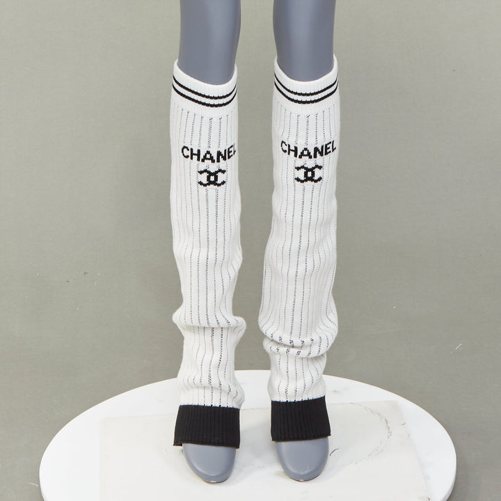 CHANEL 2024 Runway CC logo white black ribbed knit striped trim leg warmers OS