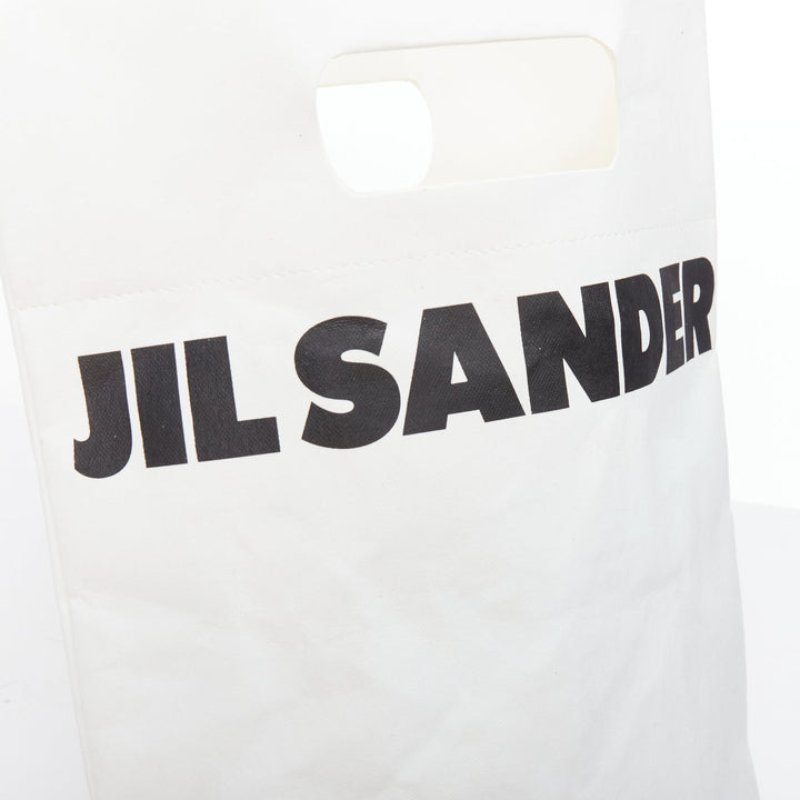 JIL SANDER cream black laminated paper logo crossbody tote bag