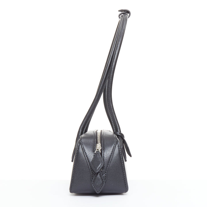 ALAIA Le Teckel black leather elongated long handle double zip bag