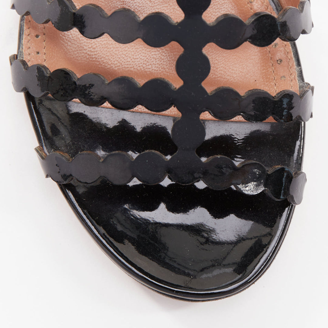 ALAIA black patent leather laser cut scalloped cage gladiator flat sandals EU36