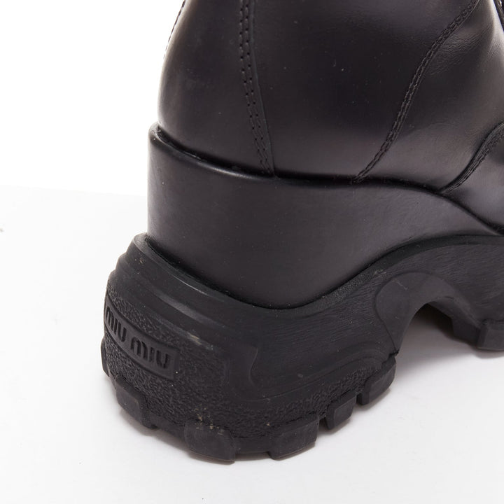 MIU MIU Runway black leather logo lace up chunky wedged military boots EU39