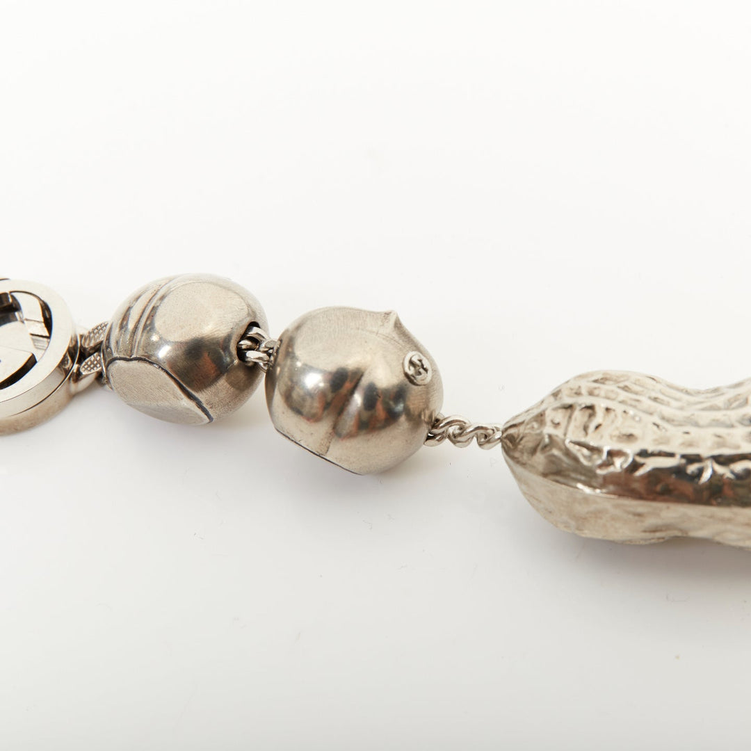 GUCCI Runway hazelnut peanut charm textured interlocking GG silver tone necklace
