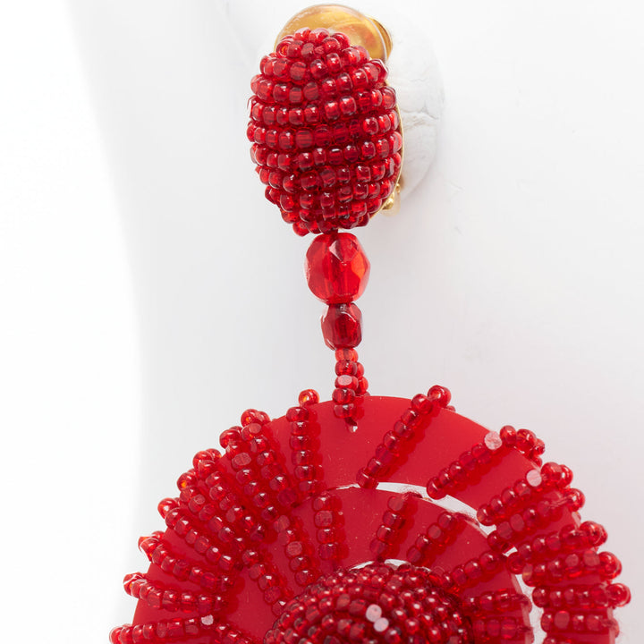 OSCAR DE LA RENTA red beaded acrylic spiral shell dangling clip on earrings pair