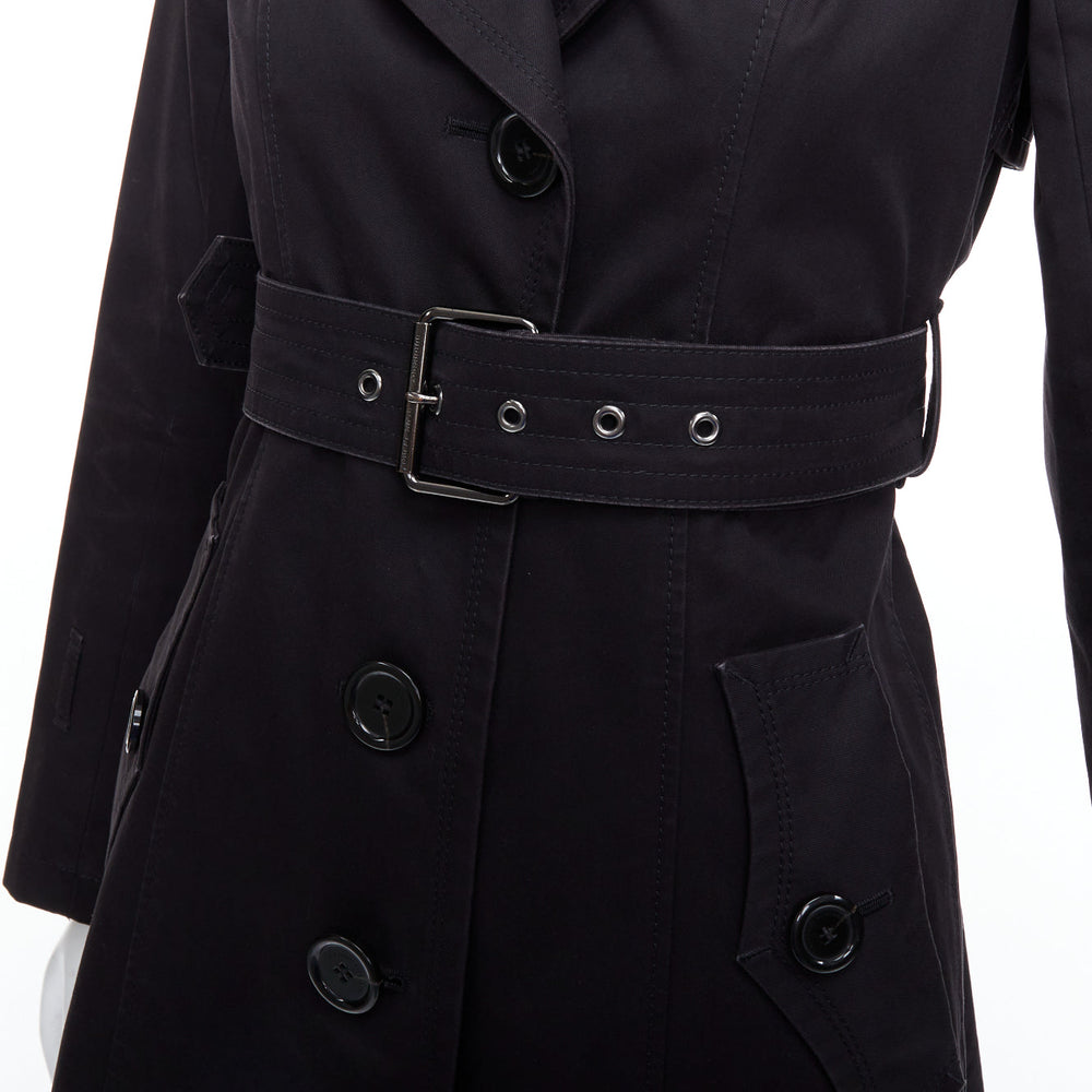 Female mannequin wearing Burberry Blue Label Black Wool Women Trench Coat in Size IT38 | Available at JHROP