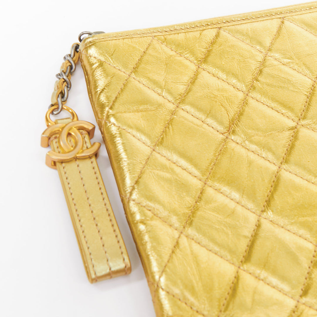 CHANEL Gabrielle O-Case Large gold aged calfskin CC logo quilted clutch bag