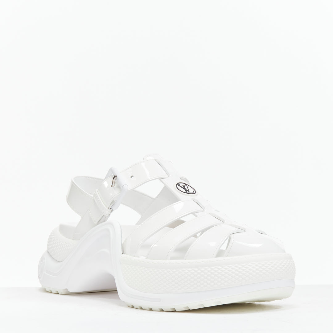 Female mannequin wearing Louis Vuitton by Nicolas Ghesquiere 2022 White Patent Leather Women Sandals in Size EU38 | Available at JHROP