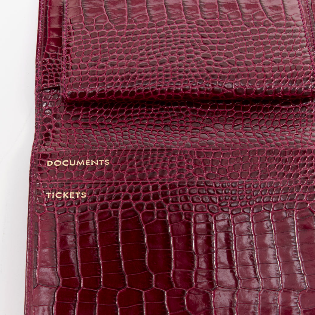 SMYTHSON Mara burgundy croc embossed high gloss teal clasp passport cover