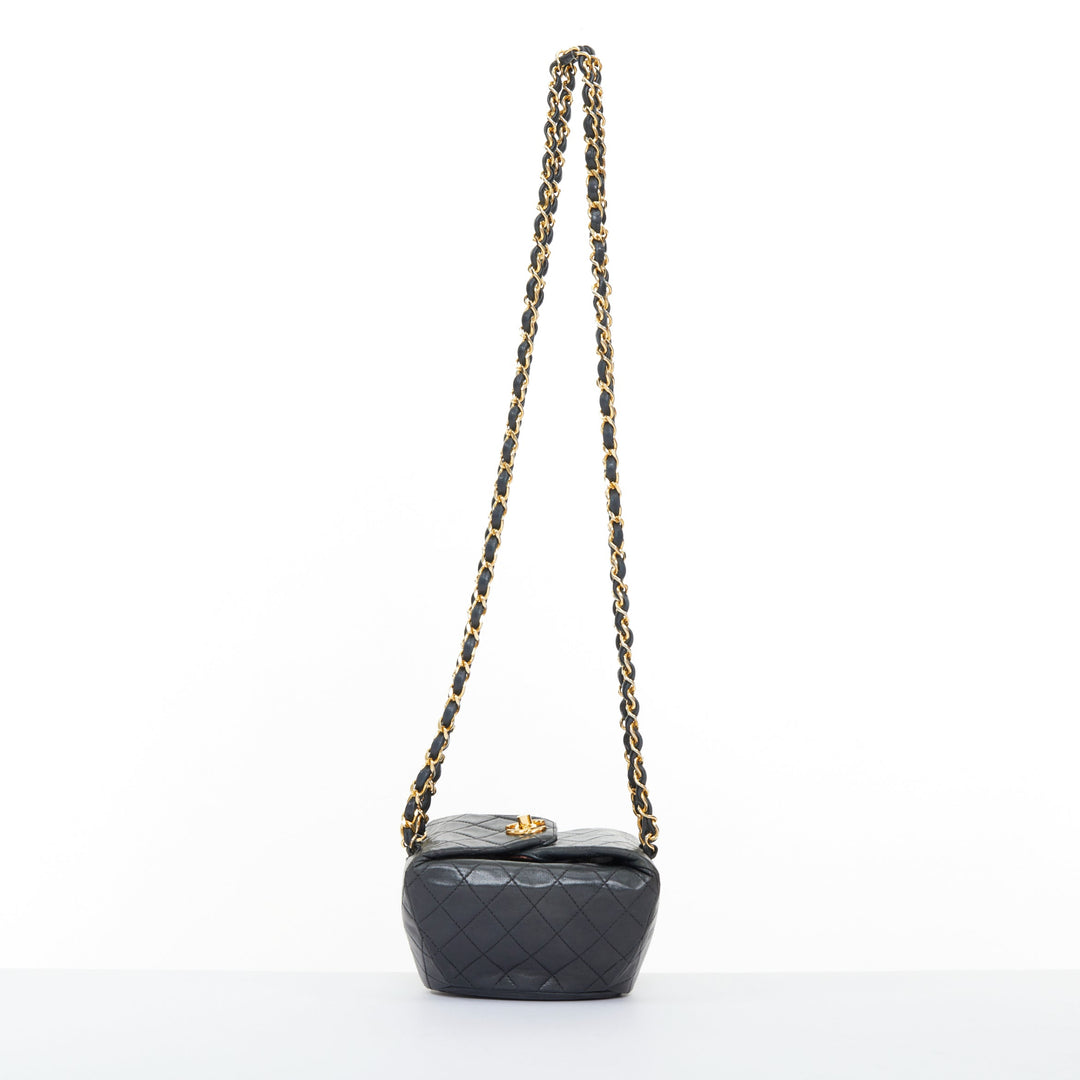 CHANEL 1990 Foldover Diamond Quilted dark grey lambskin mini bucket bag