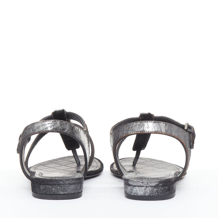 CHANEL black pony hair metallic leather CC charm T-strap thong flat sandals EU36