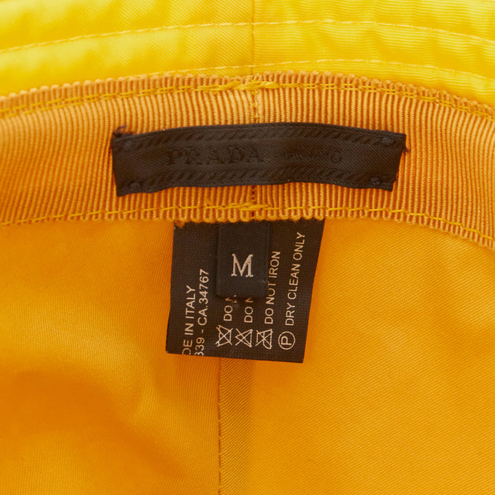 PRADA Re-Nylon mustard yellow silver logo plague topstitched bucket hat M