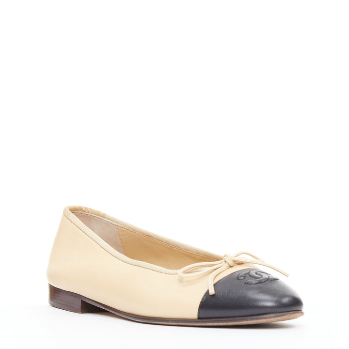 CHANEL cream black leather CC logo two tone monochrome toe cap flats EU37