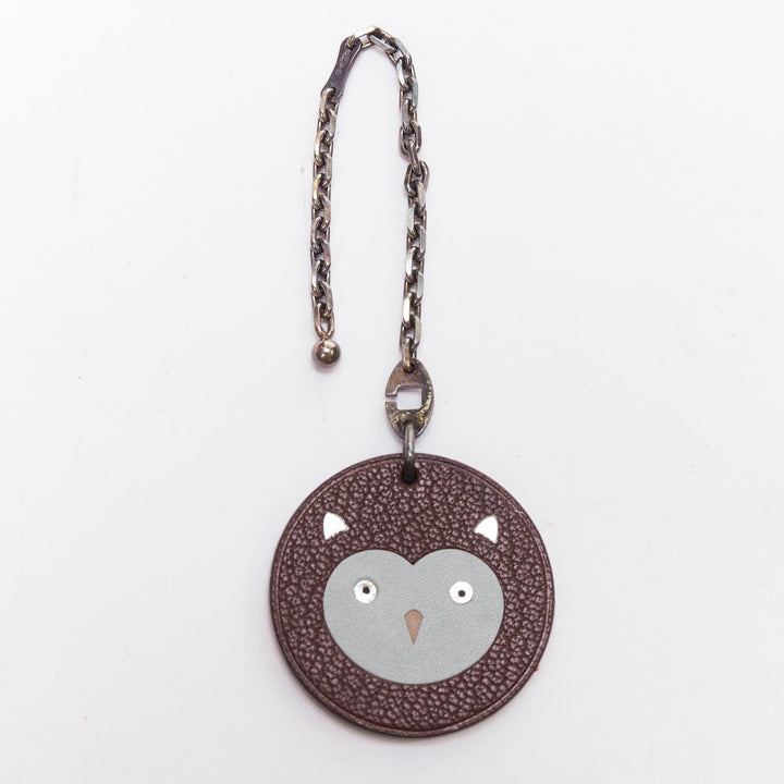 HERMES Owl brown textured leather cartoon round palladium charm