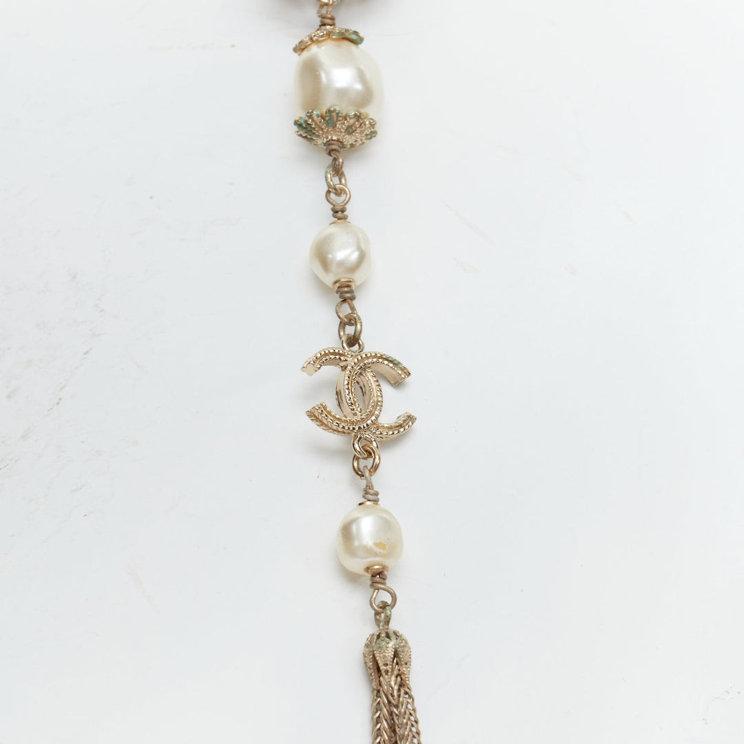 CHANEL B16A gold tone faux pearl CC logo round globes necklace