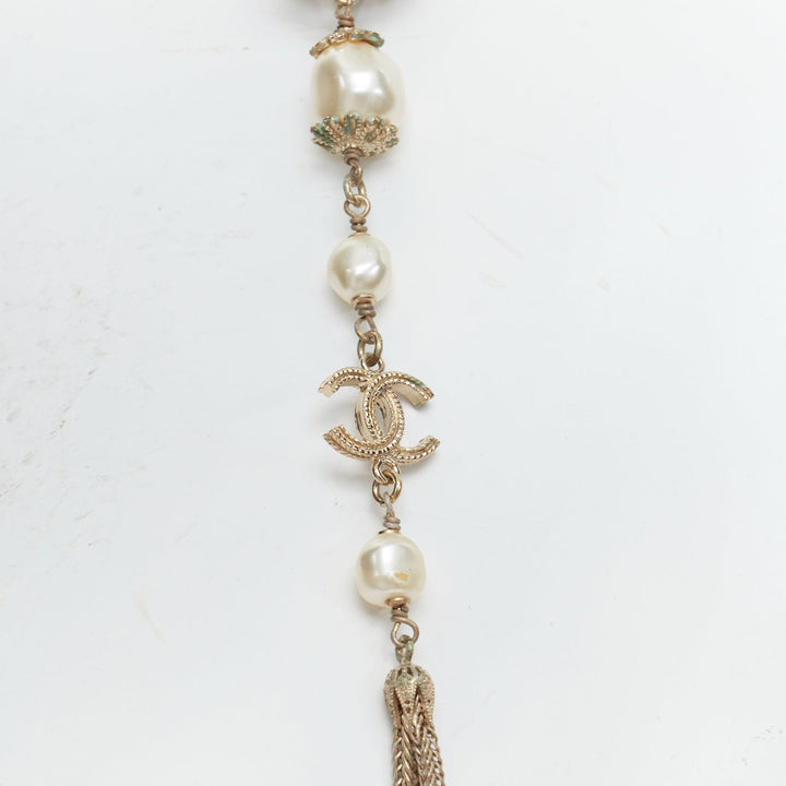 CHANEL B16A gold tone faux pearl CC logo round globes necklace