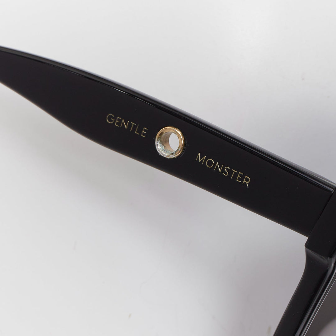 GENTLE MONSTER Jennie Kuku0 01 black gold eyelet oversized square sunglasses