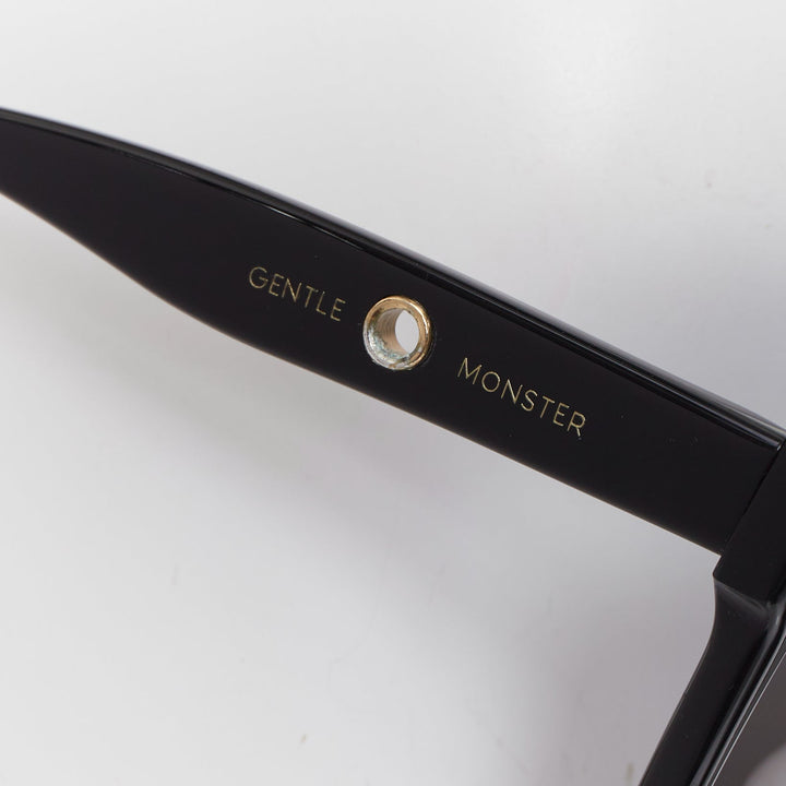 GENTLE MONSTER Jennie Kuku0 01 black gold eyelet oversized square sunglasses