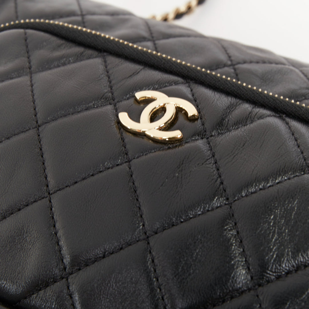 CHANEL 2024 Multi-Pocket Camera Case black quilted lambskin gold hardware bag