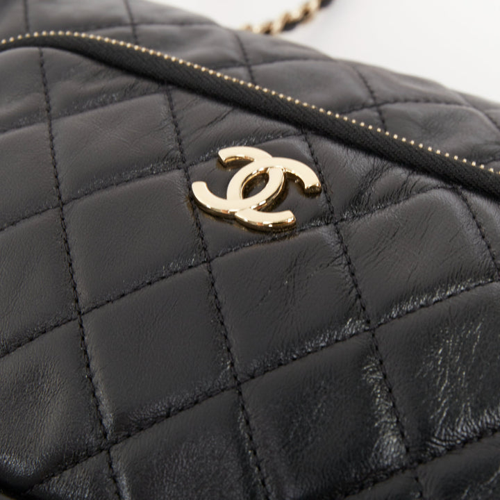 CHANEL 2024 Multi-Pocket Camera Case black quilted lambskin gold hardware bag