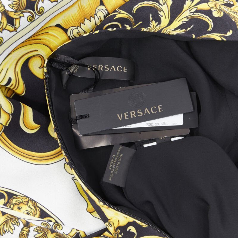 Female mannequin wearing Versace by Donatella Versace 2019 Gold Viscose Women Shift Dress in Size IT38 | Available at JHROP