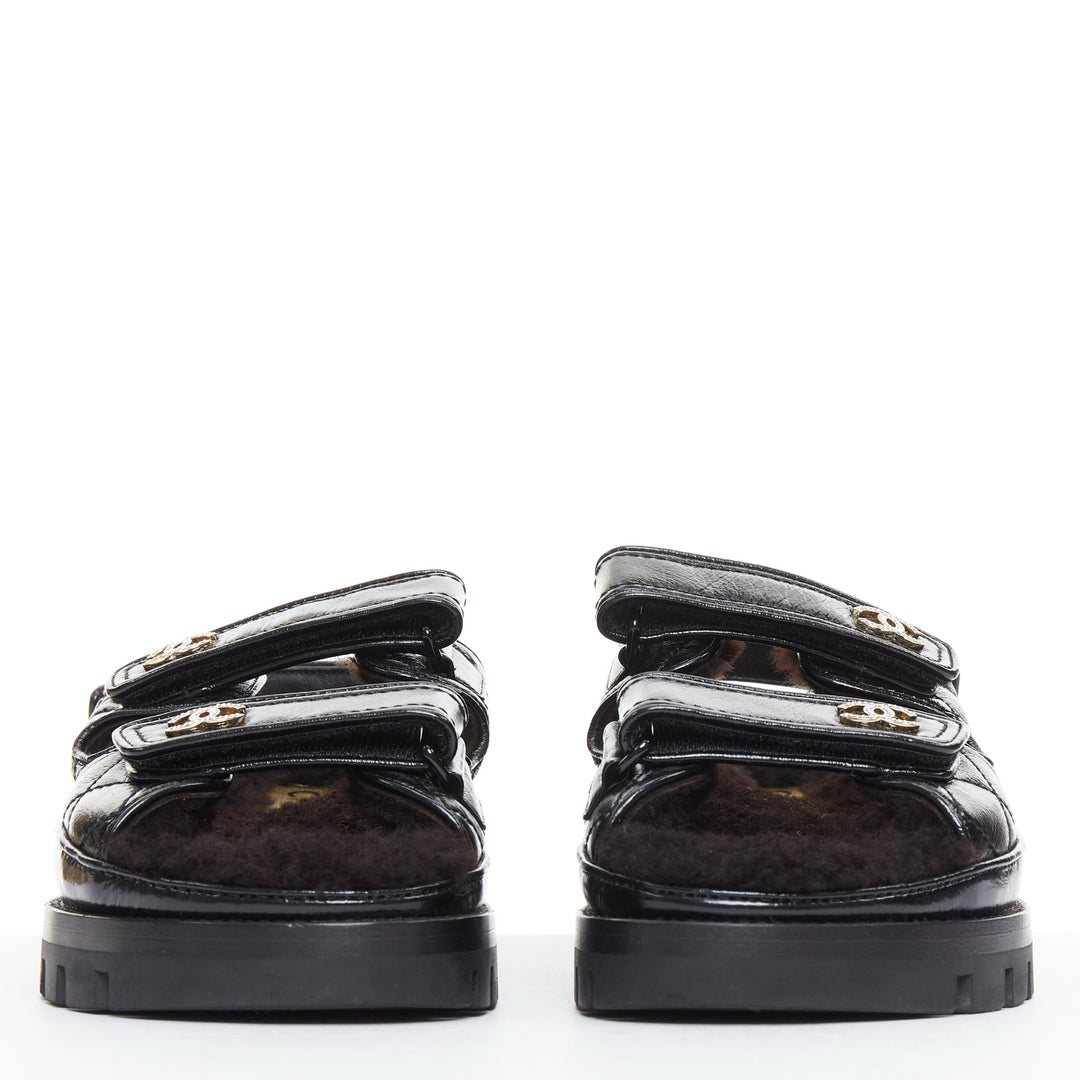 CHANEL 2023 black laminated lambskin shearling crystal CC dad sandals EU37