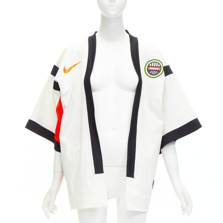 Female mannequin wearing Ambush Nike Lab 2019 White Cotton Women Coat in Size  XS | Available at JHROP