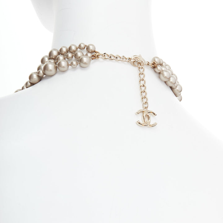 CHANEL B17 light grey faux pearl gold CC logo faceted charm triple necklace