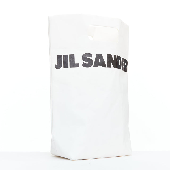 JIL SANDER cream black laminated paper logo crossbody tote bag