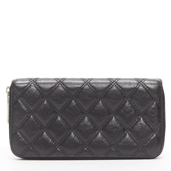 CHANEL Paris New York black quilted leather silver logo long zip wallet