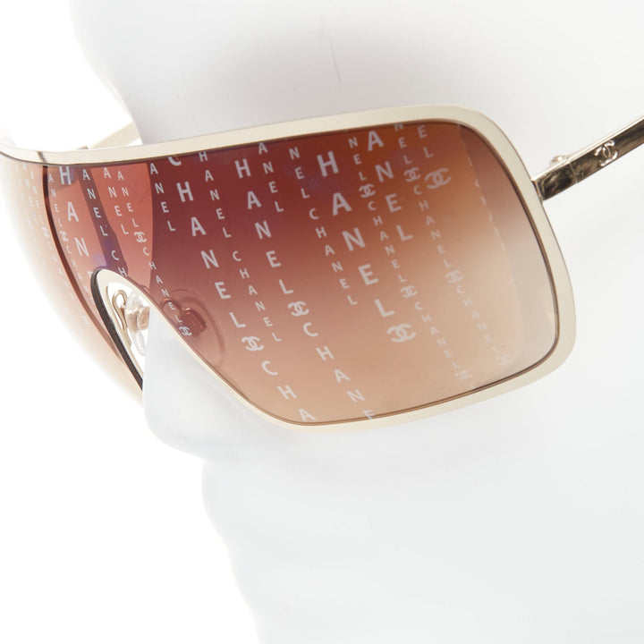 CHANEL 71213 iridescent logo monogram shield lens sunglasses Kylie Jenner