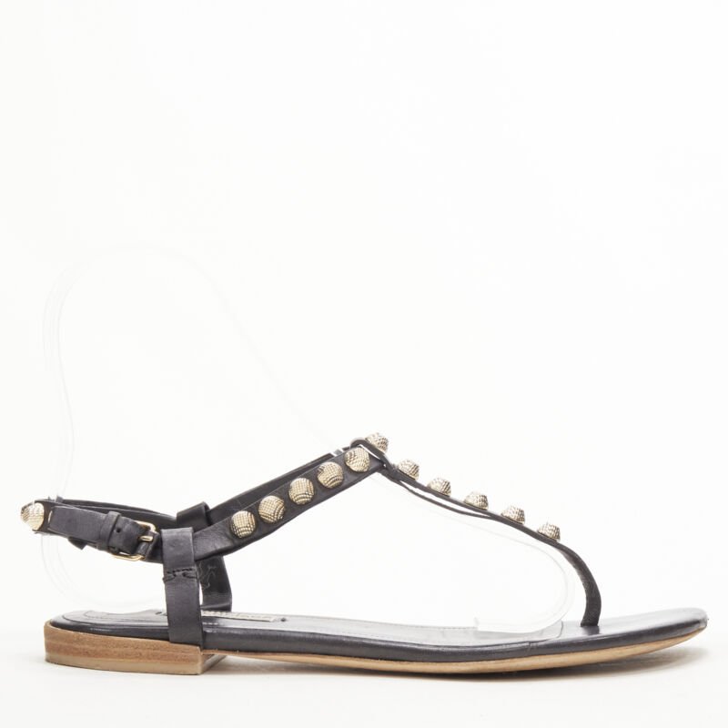 BALENCIAGA Cagole black leather gold textured  stud T-strap flat sandals EU38