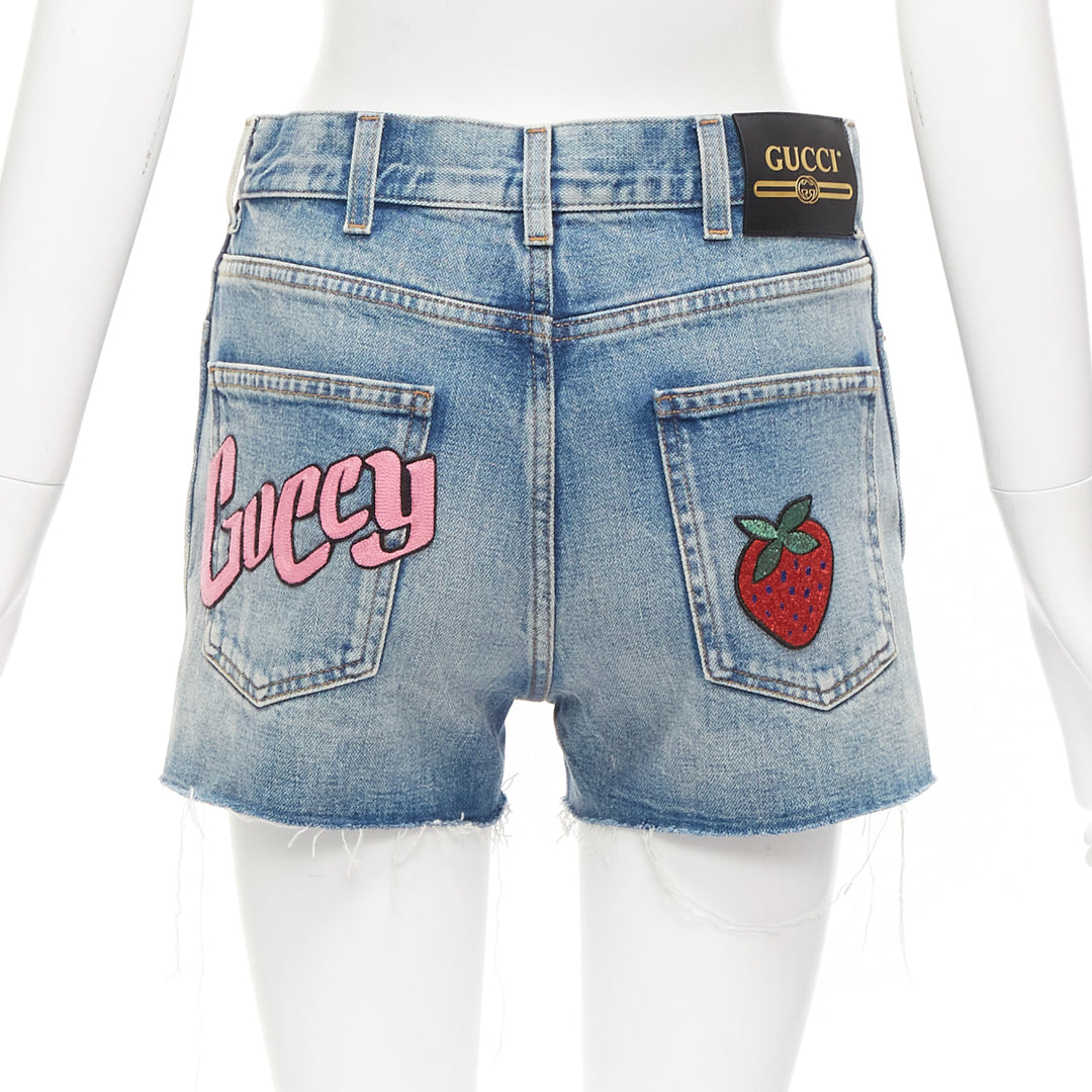 GUCCI pink logo graffiti red strawberry patch blue denim cut off shorts 22"