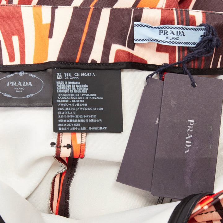 PRADA 2019 Runway orange black geometric swirl belted ruffled hem pants IT38 XS