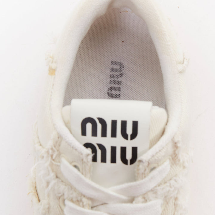 MIU MIU Denim beige raw cut frayed canvas skateboard sneakers EU37