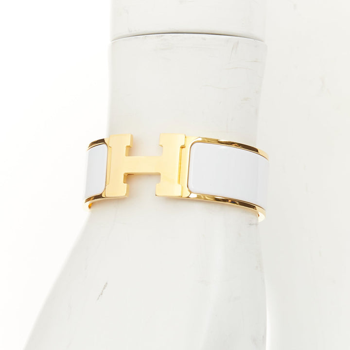 HERMES Clic H white enamel signature logo gold plated narrow cuff bracelet