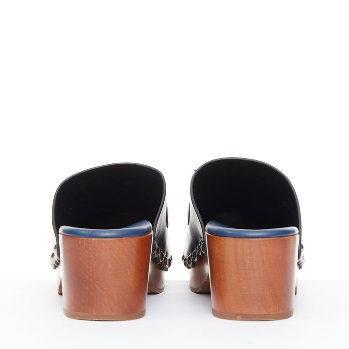 FENDI Hypnoteyes Monster Bag Bug black stud embellished wooden clog mules EU40