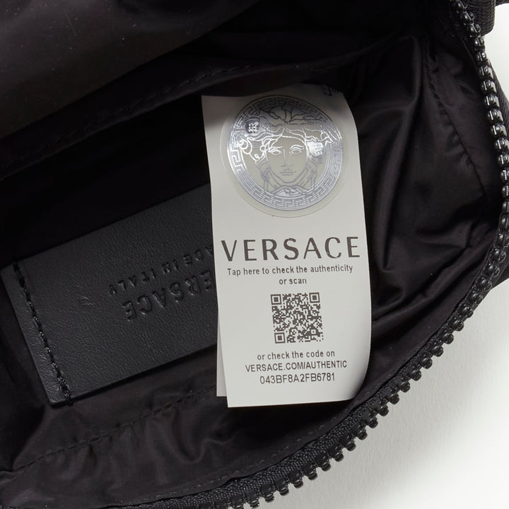 VERSACE reflective logo black nylon Greca strap crossbody messenger bag