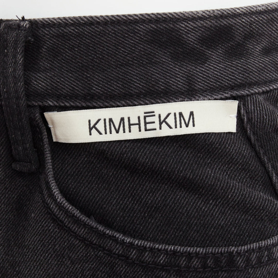 KIMHEKIM My Uniform black washed denim white logo tag frayed skirt S